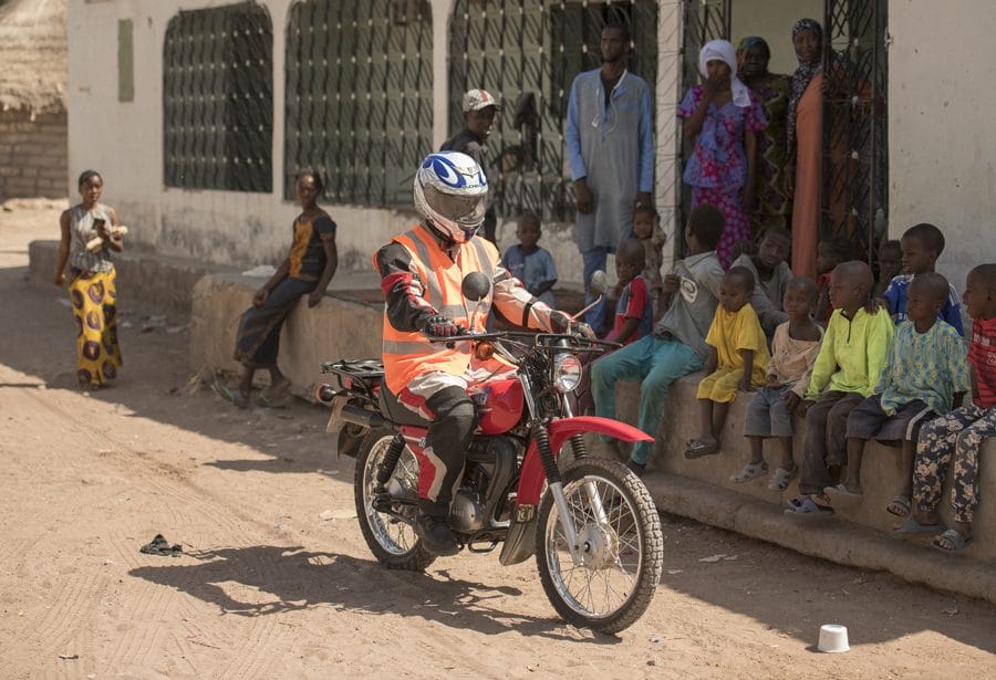 Healthworker on motorcycle - Basse The Gambia