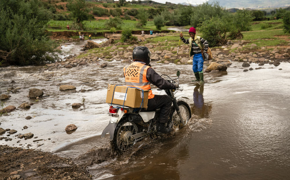 Riders for Health Lesotho, school, healthworker, sample transport, water motorcycle